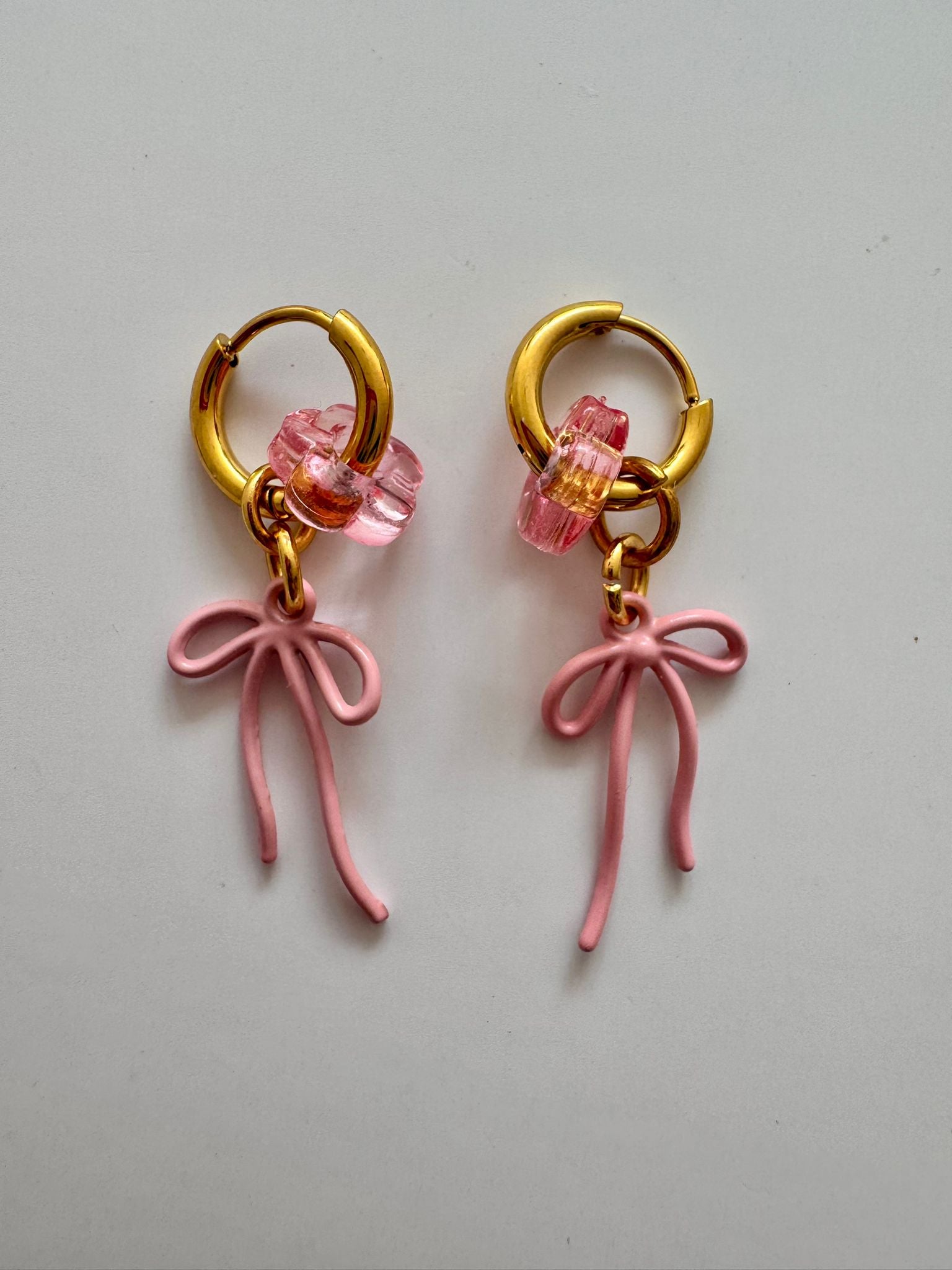 ByMelo - oorbellen - strik roze