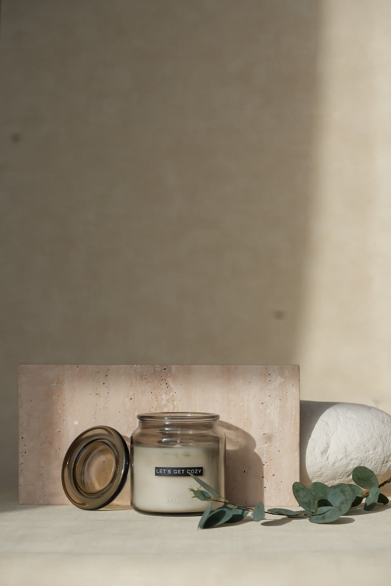 Wellmark - big scented candle smokey black - let's get cozy