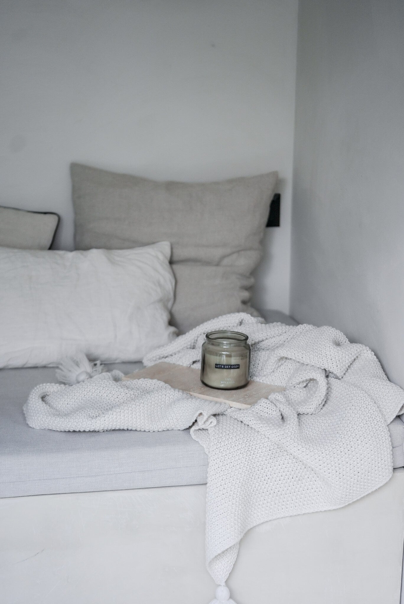 Wellmark - big scented candle smokey black - let's get cozy