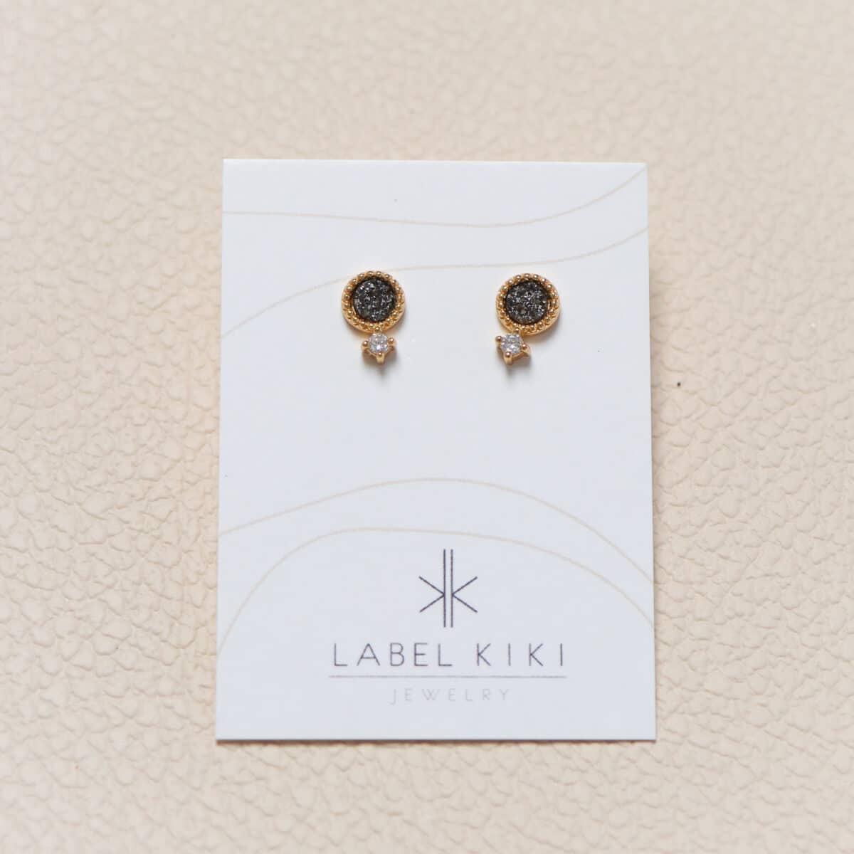 Label Kiki - grey stone gold